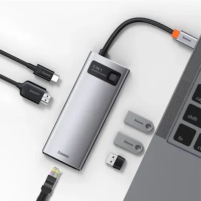 Thiết bị mở rộng hiệu Baseus Metal Gleam Series 6-in-1 Multifunctional Type-C HUB Docking Station - Giải pháp kết nối tinh gọn và mạnh mẽ cho chiếc laptop của bạn - hub chuyển đổi <strong>Baseus Metal Gleam Series 6-in-1</strong>. Với thiết kế vỏ nhôm nguyên khối sang trọng, sản phẩm mở rộng một cổng Type-C thành 6 cổng chức năng quan trọng nhất: HDMI 4K cho hình ảnh sắc nét, 3 cổng USB 3.0 truyền dữ liệu tốc độ 5Gbps, cổng mạng LAN Gigabit cho kết nối internet siêu ổn định và cổng sạc nhanh PD 100W. Đây là lựa chọn lý tưởng để tối ưu hóa không gian làm việc, giúp bạn kết nối đa nhiệm một cách liền mạch và hiệu quả. Nâng cấp trải nghiệm của bạn ngay hôm nay với <strong>Baseus Metal Gleam Series 6-in-1</strong>.